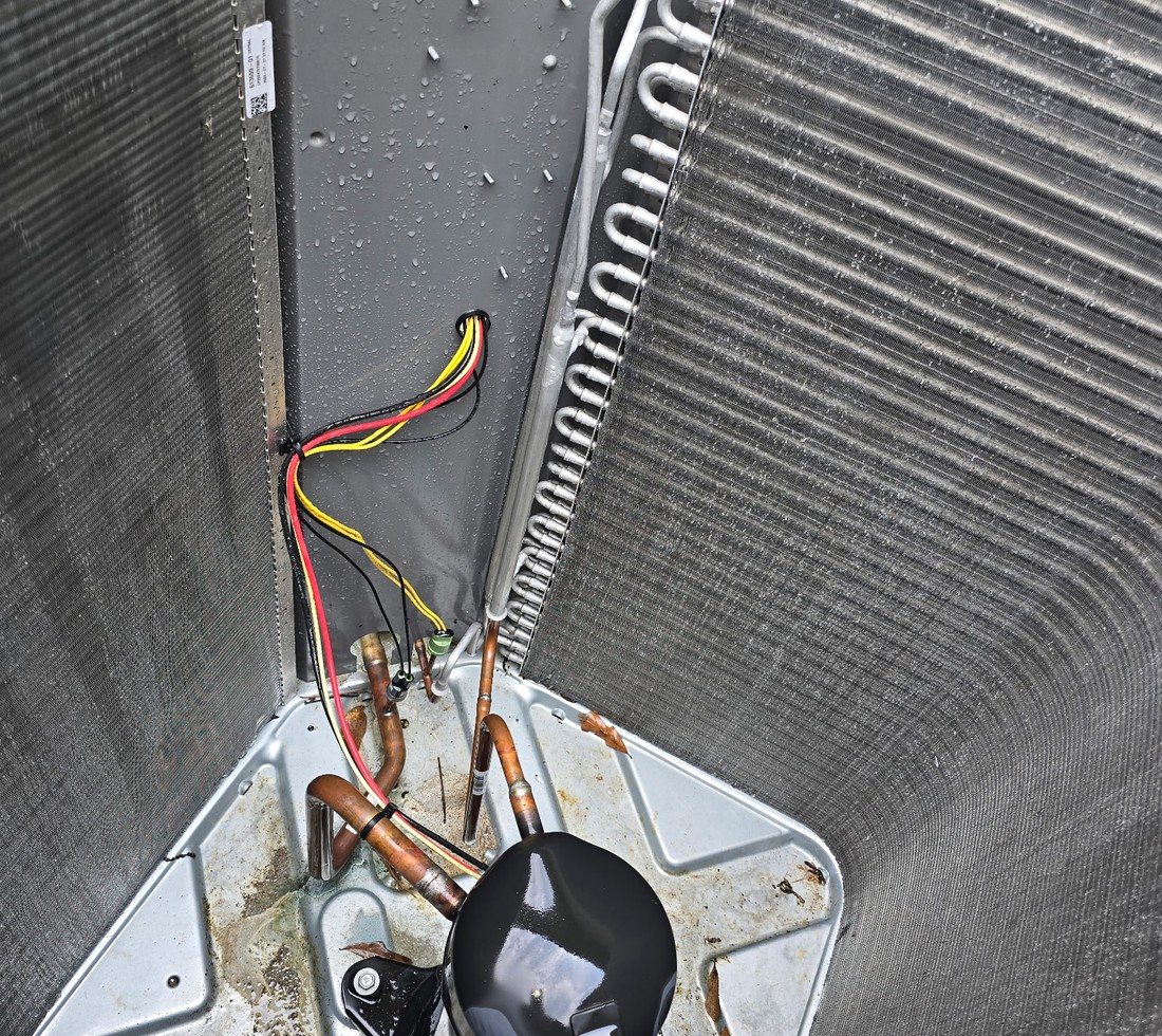 HVAC condenser coil during detailed preventative maintenance service