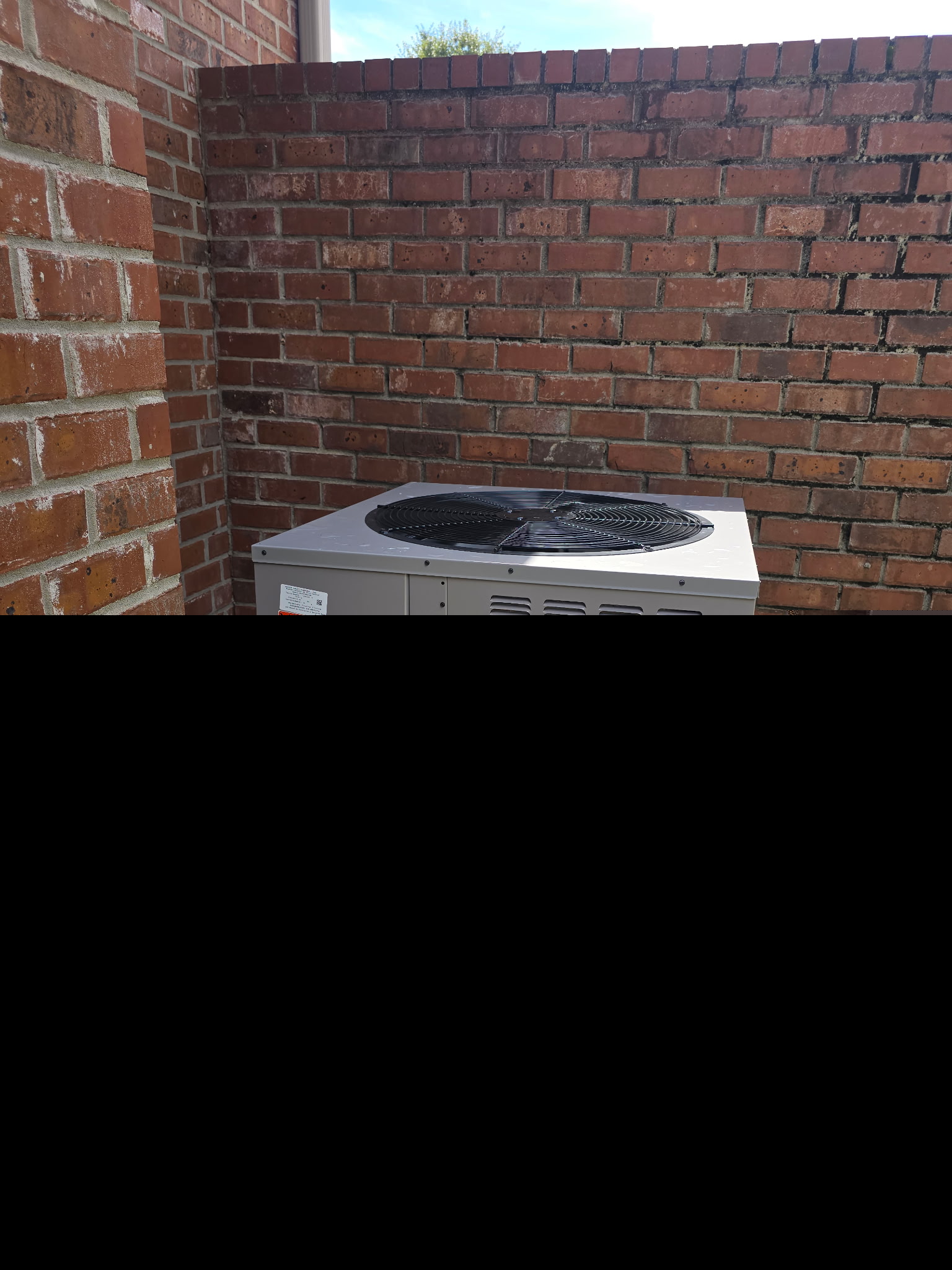 New outdoor air conditioner condenser in Hammond